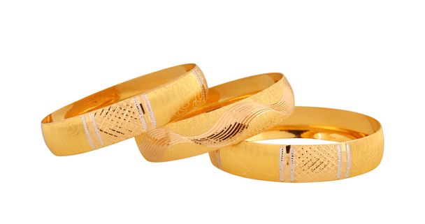 pulseras doradas aisladas sobre fondo blanco - Foto, imagen