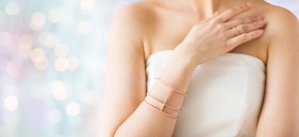 close up of beautiful woman with ring and bracelet - 写真・画像