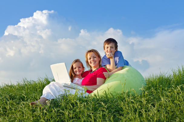 Woman with kids hanging out relaxing - Photo, Image