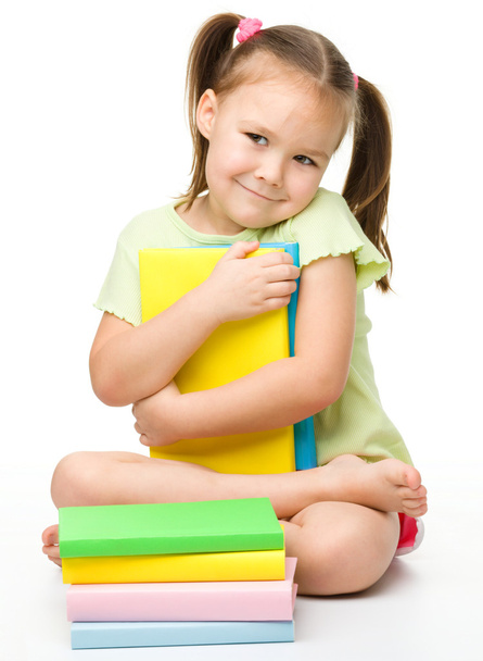Cute little girl with books - Zdjęcie, obraz