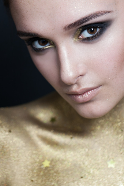 Woman with Makeup and Golden Skin. Face Closeup - Fotoğraf, Görsel