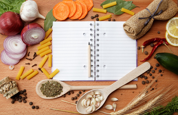 Notebook for recipes and spices on wooden table - Foto, Imagen