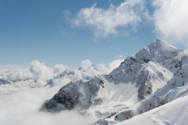 Winter mountain landscape and cloudy sky. - Valokuva, kuva