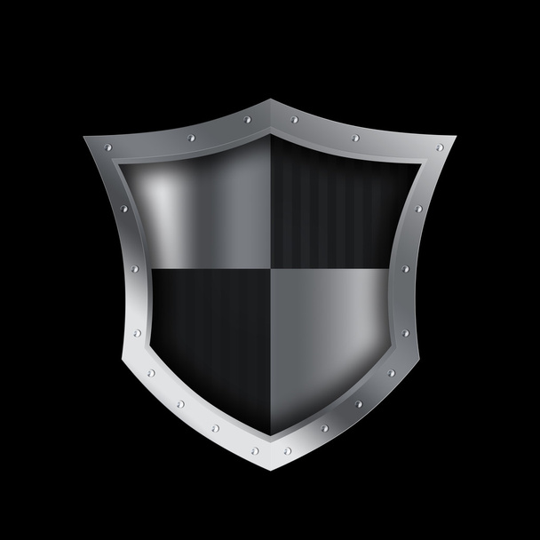 Medieval riveted shield on black background. - 写真・画像
