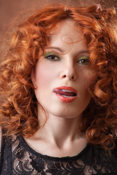 Portrait of beautiful woman with long curly red. Display languag - Foto, immagini