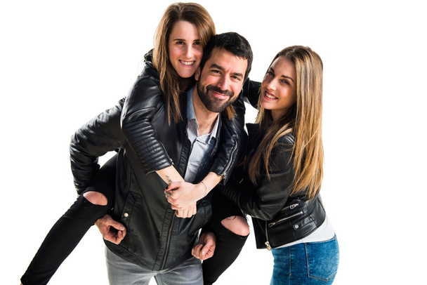 Três amigos com jaqueta de couro preto
 - Foto, Imagem