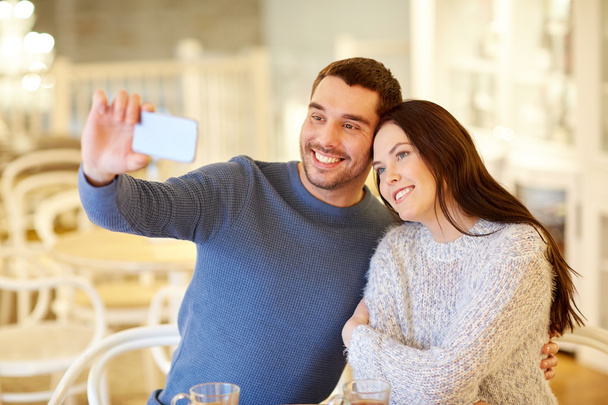 couple taking smartphone selfie at cafe restaurant - Φωτογραφία, εικόνα