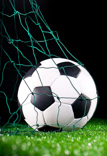 Soccer ball in the net gate - Foto, afbeelding