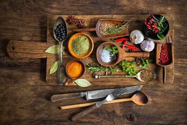 Colorful spices on wooden table - Fotoğraf, Görsel