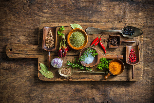 Colorful spices on wooden table - Foto, immagini