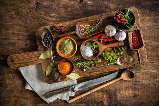 Colorful spices on wooden table - Foto, Imagen