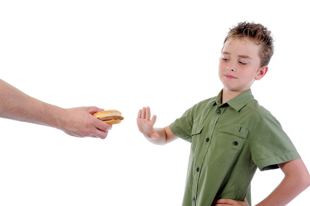 Little boy eating a hamburger - Foto, Bild