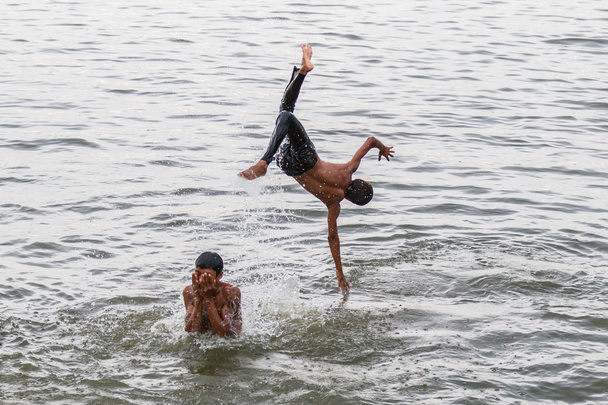 Myanmar children playing in water - Фото, изображение
