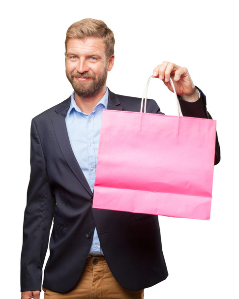 blond businessman with shopping bag - 写真・画像