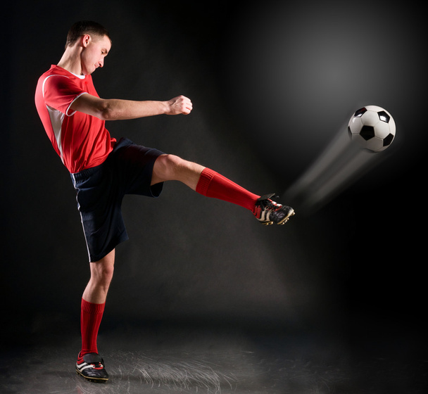 Soccer player strikes - Zdjęcie, obraz