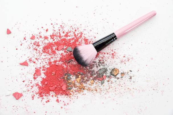 Multi Colored Powder Eyeshadow on a Brush, beauty tool blusher - Photo, Image