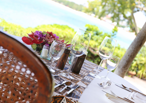 table in the restaurant on the sea background - Fotoğraf, Görsel