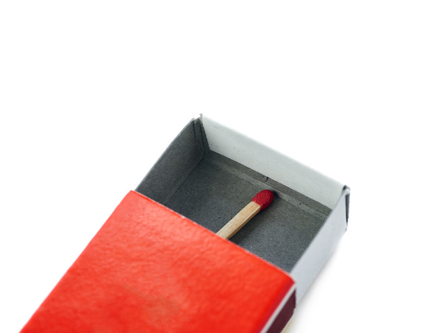 One Wooden match in box  isolated over the white background - Photo, image
