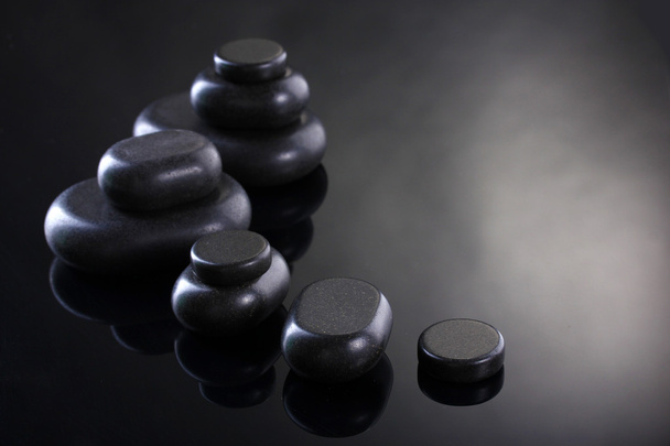 Spa stones on grey background - Фото, изображение