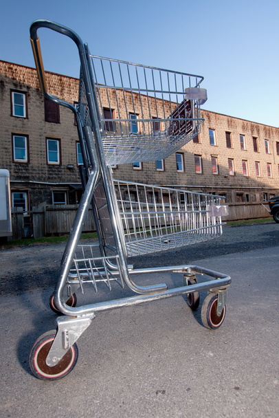 Shopping Cart In Building Parking Lot - Photo, Image