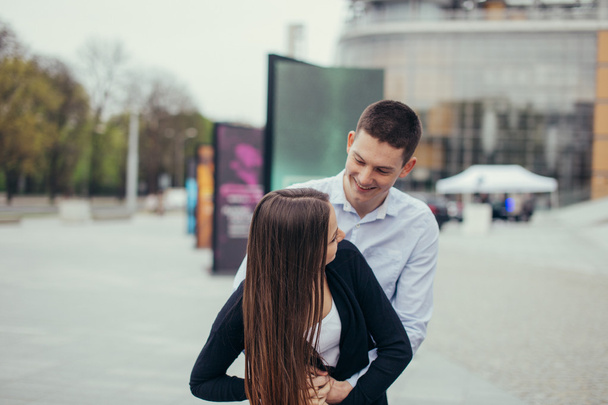 Lovely couple hugging on the street - Photo, image