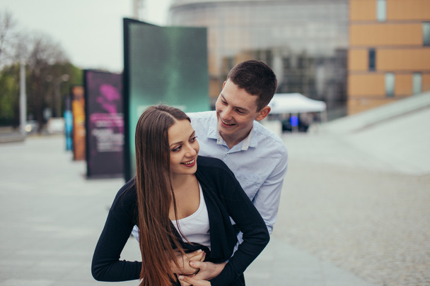 Lovely couple hugging on the street - Fotografie, Obrázek