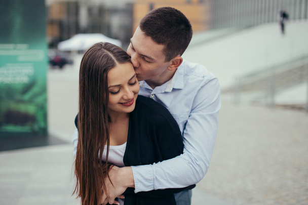 Lovely couple hugging on the street - Photo, image