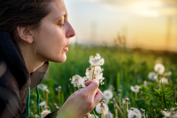 beautiful young woman with dandelion - Photo, Image