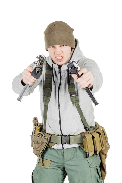 rebel or private military contractor holding black gun. war, arm - Zdjęcie, obraz