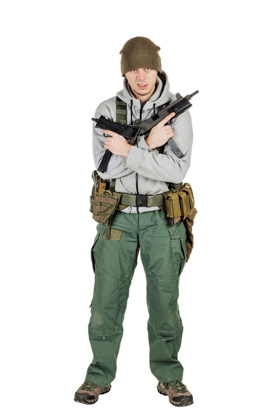 rebel or private military contractor holding black gun. war, arm - Fotoğraf, Görsel