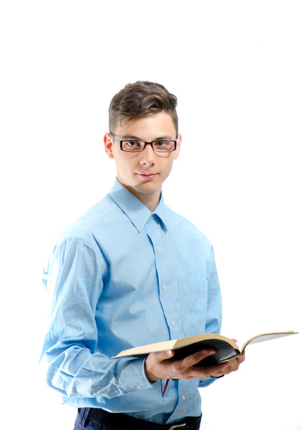 Teenager wearing glasses read form a book isolated on white - Photo, Image