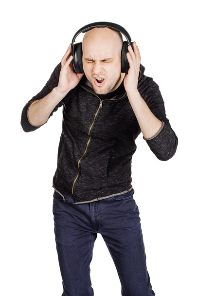 man listening to music in headphones - Fotoğraf, Görsel