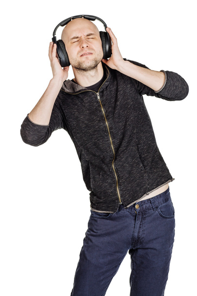 man listening to music in headphones - Foto, imagen