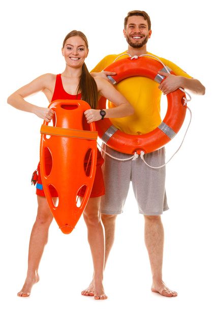 Lifeguards with rescue and ring buoy lifebuoy. - Zdjęcie, obraz