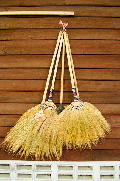 Broom on wooden wall - Photo, Image