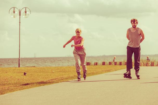 Teenagers together on skates. - Photo, Image