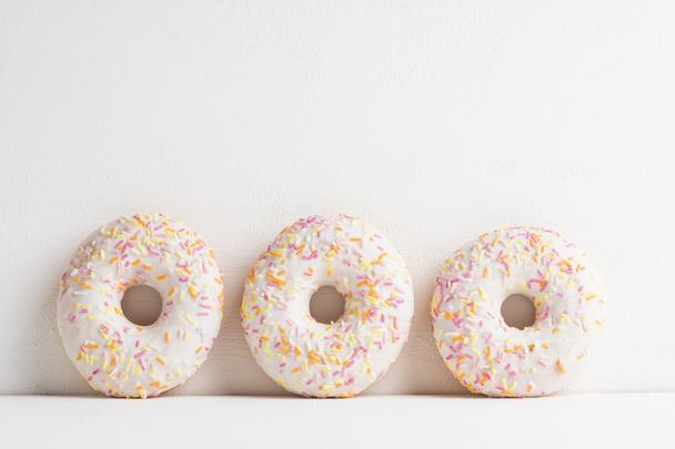 Donut with sprinkles - Фото, изображение