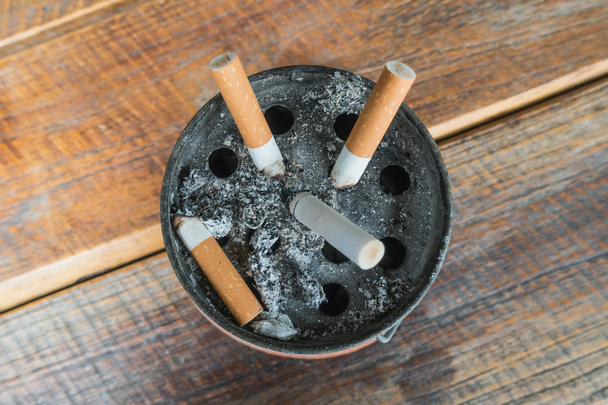 The ash of cigarettes on the ashtray - Photo, Image