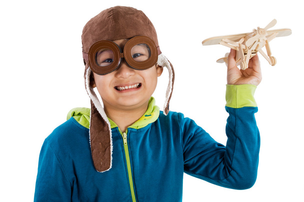 Asian Chinese Boy Playing with Wooden Airplane - Photo, Image
