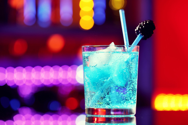 Glass of cocktail on background - 写真・画像
