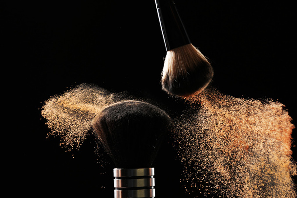 Two make up brushes with powder - Фото, зображення