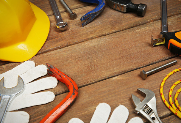 Working tools and yellow helmet  - Φωτογραφία, εικόνα