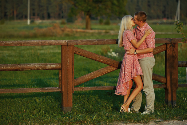 beautiful couple in country style - Fotó, kép