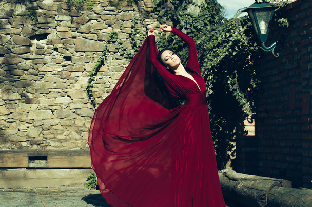 Woman in red dress outdoor - Foto, Imagem