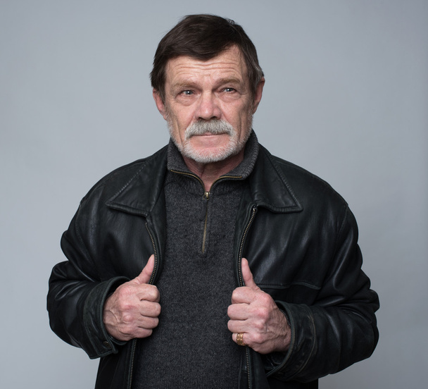 middle-aged man dressed in a gray jacket  - Fotó, kép