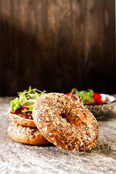 vegan bagel made at home with lettuce and sauce - Valokuva, kuva