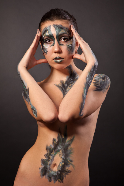 Beautiful fantasy eye face-art and bodyart portrait of a cute gi - Foto, Bild