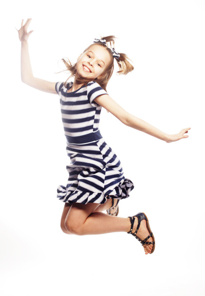 girl jumps on a white background - 写真・画像