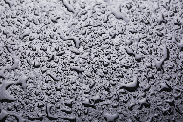 Gotas de agua en la superficie de piedra
 - Foto, Imagen