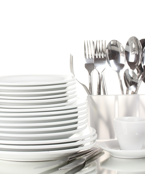 Clean plates and cutlery isolated on white - Photo, image